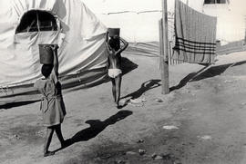 Children fetching water in the Onverwacht resettlement camp in Botshabelo, a large black ghetto s...