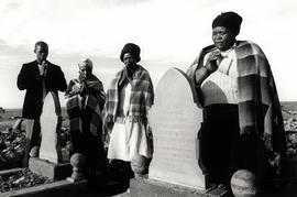 Mogopa women praying at the graves of their ancestors on the eve of their forced removal, planned...