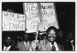 Inkatha leader Buthelezi and supporters with anti-disinvestment signs