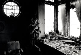 Anne Mackay, member of the End Conscription Campaign, in her house after a petrol bomb attack in ...