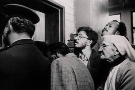 Mohammed Valli, UDF secretary in the Transvaal (middle, with glasses) outside the courtroom durin...