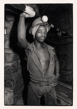 A goldmine worker underground at Hartebeesfontein mine