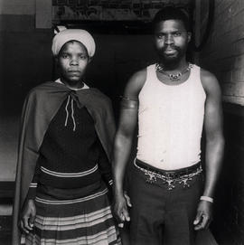 Black woman with her husband (migrant worker) at the Mai-Mai bazaar in Johannesburg