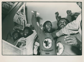 Moses Mayekiso celebrating with others.