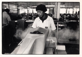 Female garment worker in factory