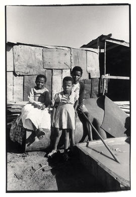 Three children in front of shack in KwaNdebele