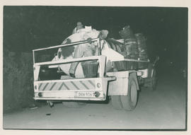 Municipal workers collecting refuse
