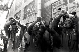 Workers of a Germiston factory singing freedom songs during a workstoppage in protest of the dete...