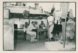 Scene from life in a men's hostel: Views of the inmates in their living quarters