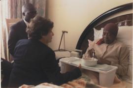 Beata Lipman on bedside of Albertina Sisulu, probably right after Walter Sisulu died