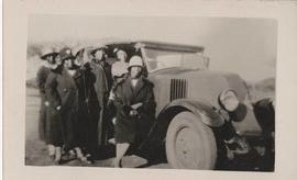 Group with S T Plaatje's motor car, inncribed "on the way to Barkly Show"