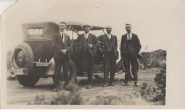 Group. S T Plaatje second from left, photographed at his metor-car