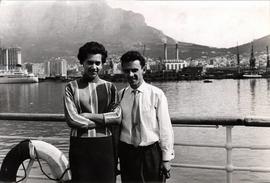 Couple on board a ship with Table Mountain in background