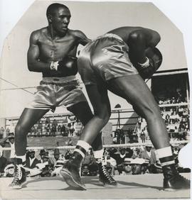 Boxing fight, possibly between Enoch "Schoolboy" Nhlapo vs. Joas "Kangaroo" M...