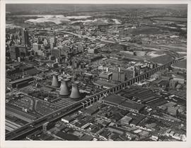 Birds eye view of M1 and M2 motorway, with Newtown precinct and Cooling Towers