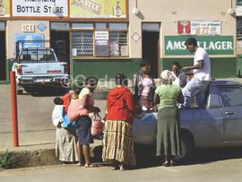 A trader sells merchandise from the back of his bakkie. Richmond, KwaZulu Natal