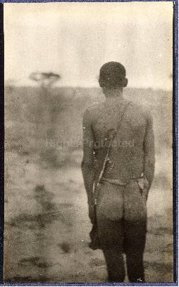 A Bushman standing in the field, Nossop