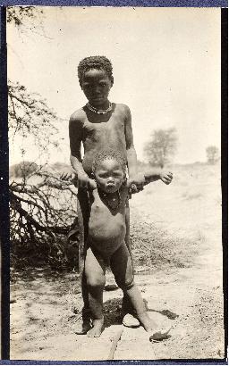 An older boy holding a younger boy, Nossop